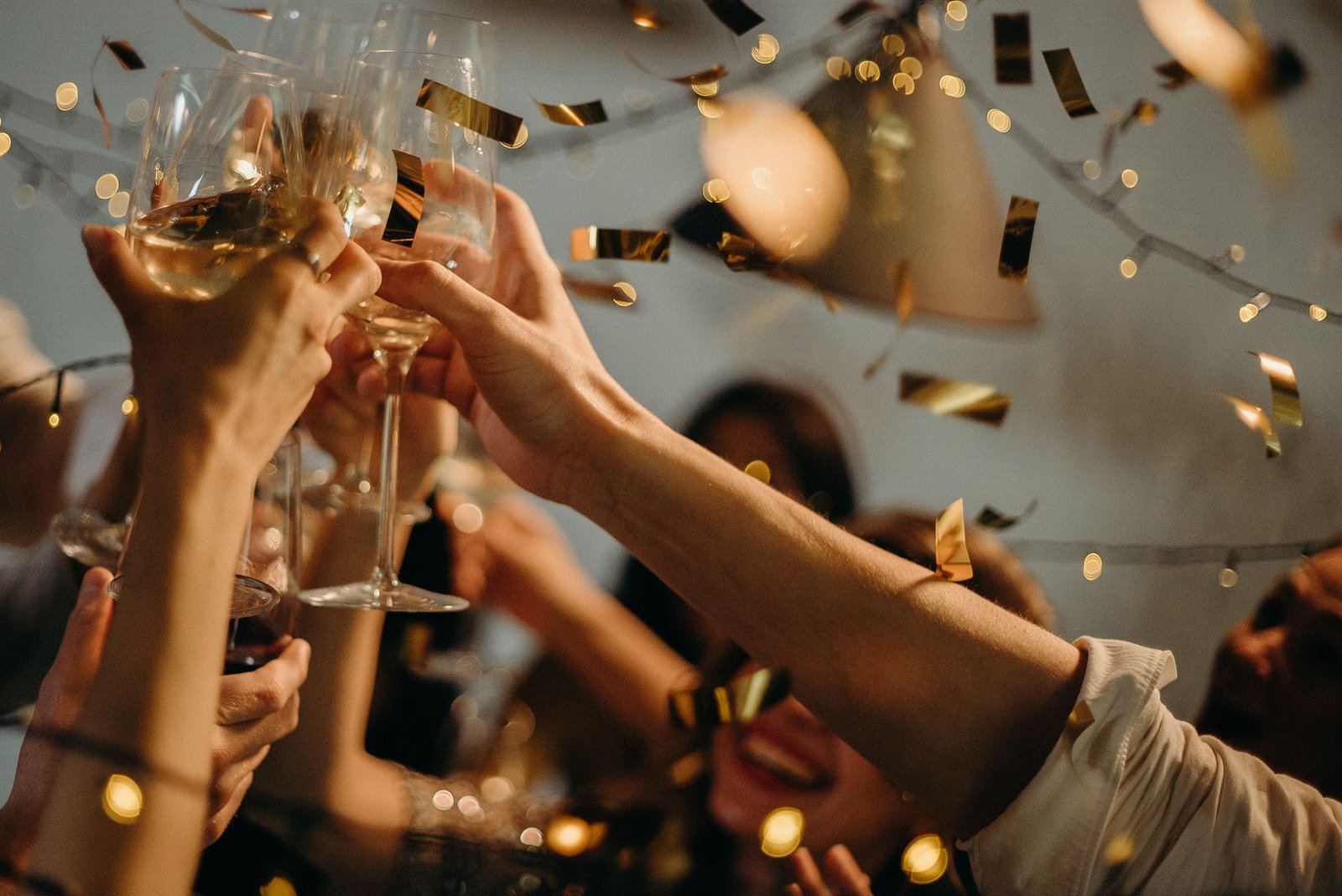 Guests raising glasses at a celebration