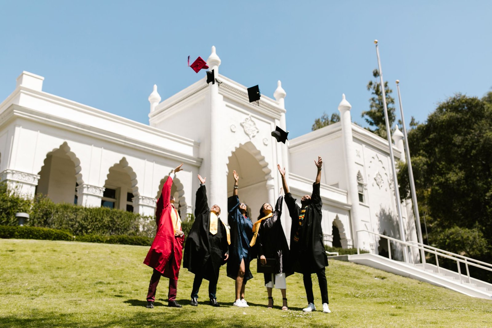 Graduates tossing their caps