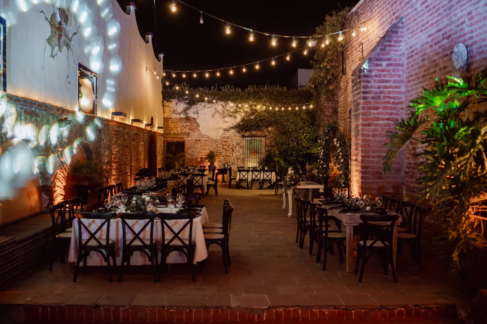String lights over dinner tables